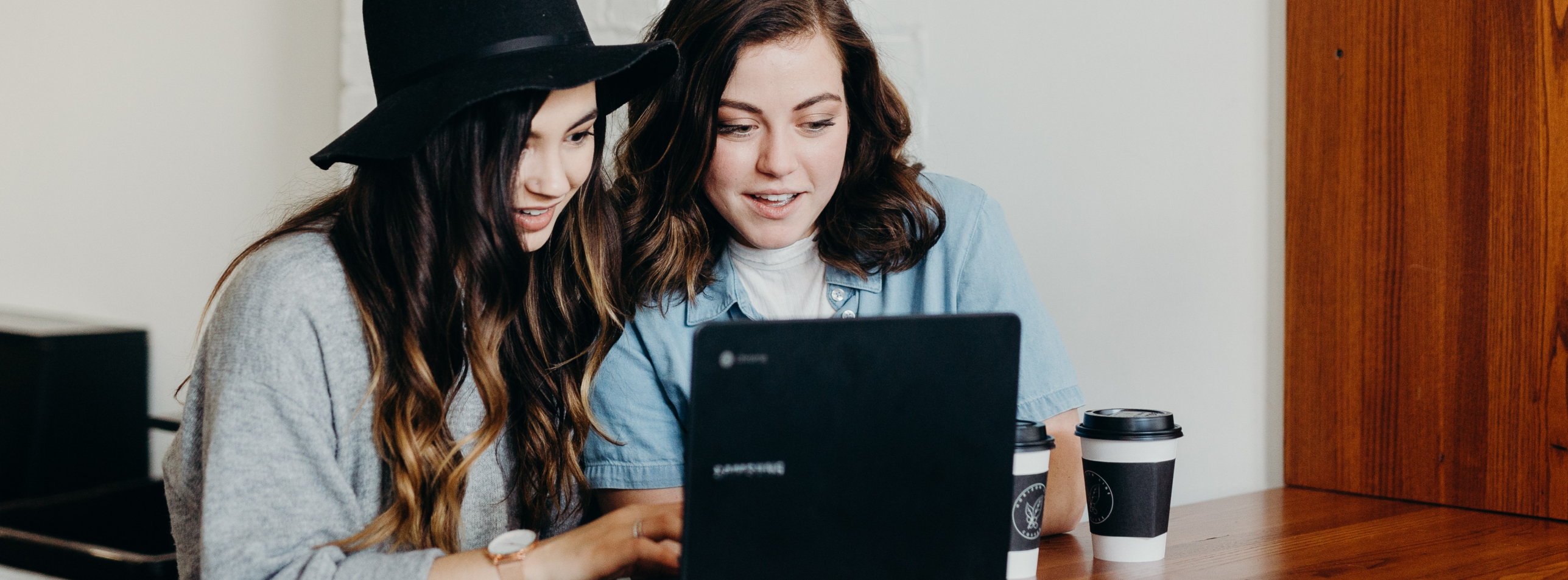 A woman taking a knowledge test with her Trainer